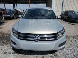 2012 Volkswagen Tiguan SE z VIN WVGAV7AX0CW509206, wystawiony jako Copart lot #52226395 z przebiegiem 108 922 mil mil oraz Szkody całkowita. Historia ofert i sprzedaży dostępna na DreamBid. Obrazek 5.