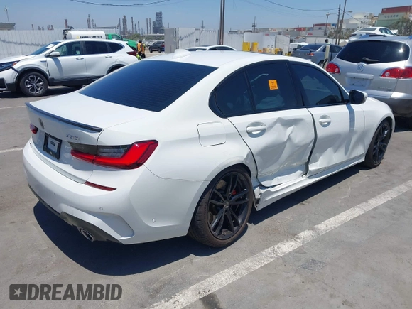 2019 BMW 3 Series 330i with VIN WBA5R1C55KAJ98934, listed as a IAAI auction lot 42396379 with 65,946 mi miles and . Bid and sale history available at DreamBid. Image 4.