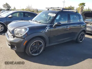 2016 MINI Countryman S with VIN WMWZC3C54GWT08932, listed as a Copart auction lot 51185955 with 101,023 mi miles and Salvage Title. Bid and sale history available at DreamBid. Image 1.