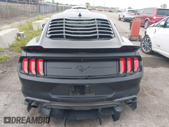 2021 Ford Mustang EcoBoost z VIN 1FA6P8TH7M5132841, wystawiony jako IAAI lot #42364830 z przebiegiem 22 331 mil mil oraz . Historia ofert i sprzedaży dostępna na DreamBid. Obrazek 16.