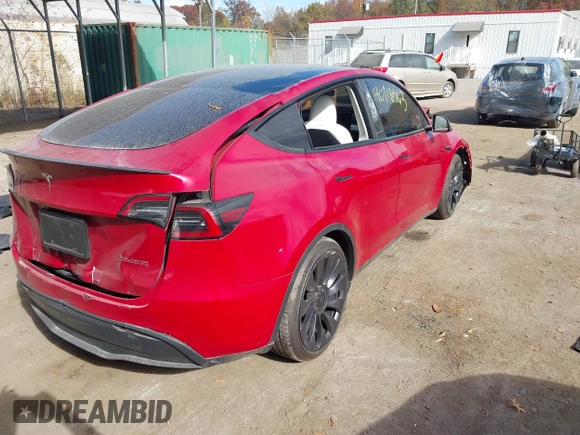 2023 Tesla Model Y Performance with VIN 7SAYGDEF6PF870935, listed as a IAAI auction lot 40718563 with 15,286 mi miles and . Bid and sale history available at DreamBid. Image 4.