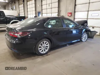 2023 Toyota Camry LE z VIN 4T1R11AK3PU776521, wystawiony jako Copart lot #55927255 z przebiegiem 50 323 mil mil oraz Szkoda całkowita • Salvage title. Historia ofert i sprzedaży dostępna na DreamBid. Obrazek 3.