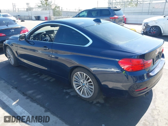 2016 BMW 4 Series 428i with VIN WBA3N7C59GK227052, listed as a IAAI auction lot 41643344 with 69,503 mi miles and . Bid and sale history available at carsss.com. Image 3.
