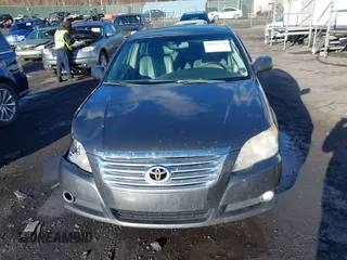 2008 Toyota Avalon XL with VIN 4T1BK36B18U311398, listed as a IAAI auction lot 40932176 with 272,607 mi miles. Bid and sale history available at carsss.com. Image 12.