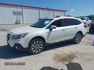 2018 Subaru Outback Touring with VIN 4S4BSATC5J3336205, listed as a IAAI auction lot 42201530 with 103,362 mi miles and . Bid and sale history available at DreamBid. Image 17.