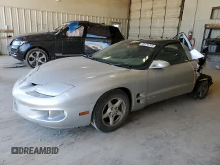 1999 Pontiac Firebird Firebird with VIN 2G2FS22K4X2235609, listed as a Copart auction lot 56476455 with 223,876 mi miles and Salvage title. Bid and sale history available at DreamBid. Image 1.
