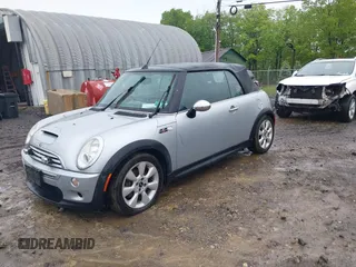 2006 MINI Convertible S with VIN WMWRH33586TF88407, listed as a IAAI auction lot 42223156 with 199,948 mi miles and . Bid and sale history available at DreamBid. Image 2.