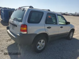 2002 Ford Escape XLS Choice with VIN 1FMYU02112KB00947, listed as a Copart auction lot 48948855 with 223,287 mi miles and Salvage title. Bid and sale history available at DreamBid. Image 3.