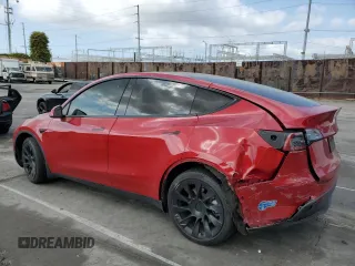 2021 Tesla Model Y Long Range with VIN 5YJYGDEEXMF217816, listed as a Copart auction lot 51008665 with 57,392 mi miles and Salvage Title. Bid and sale history available at DreamBid. Image 2.