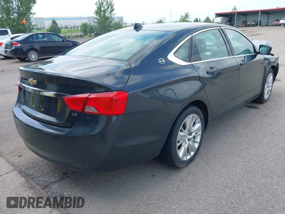 2014 Chevrolet Impala LS with VIN 1G11X5SL0EU164667, listed as a IAAI auction lot 42542110 with 150,458 mi miles and . Bid and sale history available at DreamBid. Image 4.