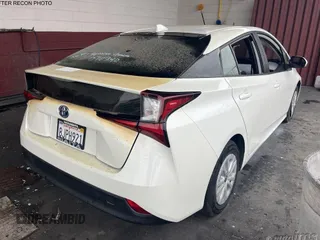 2019 Toyota Prius L Eco z VIN JTDKARFU3K3070940, wystawiony jako IAAI lot #42545101 z przebiegiem 48 786 mil mil oraz . Historia ofert i sprzedaży dostępna na DreamBid. Obrazek 1.