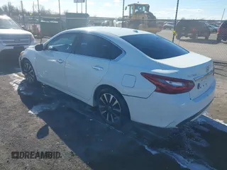 2018 Nissan Altima S with VIN 1N4AL3AP9JC181033, listed as a IAAI auction lot 41400570 with 198,928 mi miles and . Bid and sale history available at carsss.com. Image 3.
