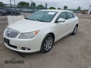 2012 Buick LaCrosse Premium 2 z VIN 1G4GF5E34CF289314, wystawiony jako IAAI lot #42331342 z przebiegiem 300 129 mil mil oraz . Historia ofert i sprzedaży dostępna na DreamBid. Obrazek 17.