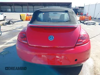 2013 Volkswagen Beetle 2.5L with VIN 3VW5P7AT1DM833048, listed as a IAAI auction lot 41769453 with Not Provided miles and . Bid and sale history available at DreamBid. Image 16.