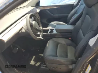 2024 Tesla Model Y Long Range z VIN 7SAYGAEE0RF101971, wystawiony jako Copart lot #58794335 z przebiegiem 16 099 mil mil oraz Szkoda całkowita • Salvage title. Historia ofert i sprzedaży dostępna na DreamBid. Obrazek 7.