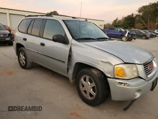 2008 GMC Envoy SLE1 with VIN 1GKDS13S282122684, listed as a Copart auction lot 80488104 with 262,167 mi miles and Salvage Title. Bid and sale history available at DreamBid. Image 4.