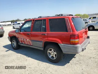 1997 Jeep Grand Cherokee TSi with VIN 1J4FX58SXVC545910, listed as a Copart auction lot 73142554 with 180,896 mi miles and Salvage Title. Bid and sale history available at carsss.com. Image 2.