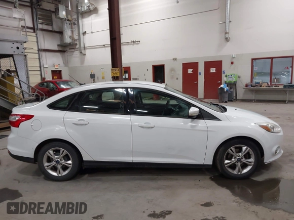 2013 Ford Focus SE with VIN 1FADP3F21DL341649, listed as a IAAI auction lot 42465450 with 180,219 mi miles and . Bid and sale history available at DreamBid. Image 14.