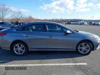 2018 Hyundai Sonata SEL with VIN 5NPE34AFXJH718120, listed as a IAAI auction lot 41847879 with 84,408 mi miles and . Bid and sale history available at carsss.com. Image 13.