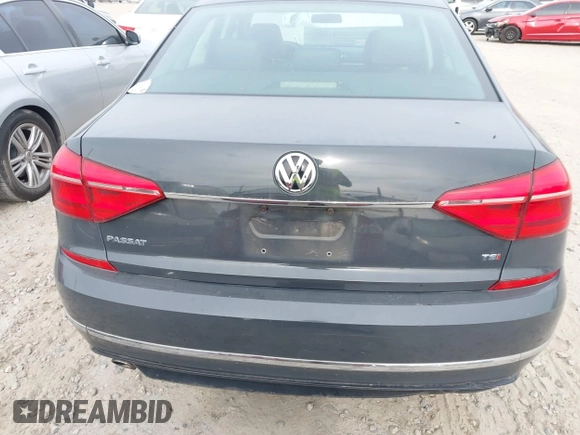 2016 Volkswagen Passat S with VIN 1VWAT7A37GC042880, listed as a IAAI auction lot 42092850 with 215,267 mi miles and . Bid and sale history available at DreamBid. Image 16.