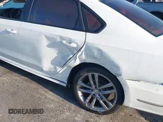 2018 Volkswagen Passat 2.0T S with VIN 1VWAA7A35JC009020, listed as a IAAI auction lot 41955626 with 99,900 mi miles. Bid and sale history available at carsss.com. Image 6.