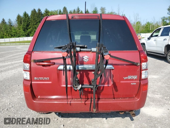 2012 Suzuki Grand Vitara Premium z VIN JS3TD0D60C4100503, wystawiony jako Copart lot #59050575 z przebiegiem 158 052 mil mil oraz Tytuł czysty. Historia ofert i sprzedaży dostępna na DreamBid. Obrazek 6.