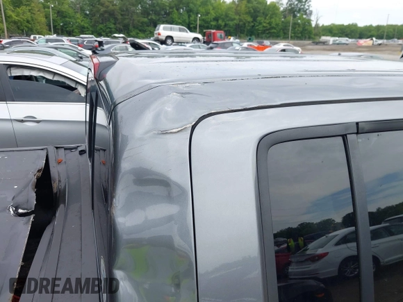 2018 Nissan Frontier SV with VIN 1N6AD0EV4JN726457, listed as a IAAI auction lot 42348883 with 97,880 mi miles and . Bid and sale history available at DreamBid. Image 6.