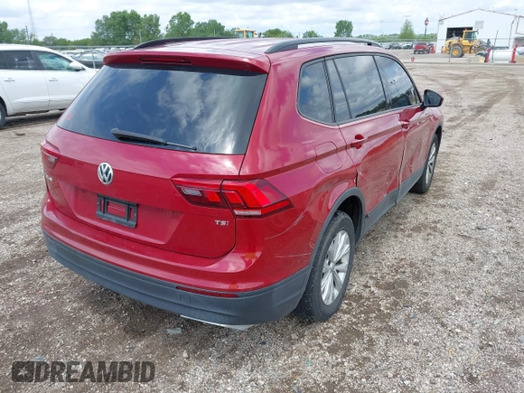 2018 Volkswagen Tiguan S with VIN 3VV1B7AX3JM045193, listed as a IAAI auction lot 42311886 with 69,049 mi miles and . Bid and sale history available at DreamBid. Image 4.