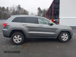 2011 Jeep Grand Cherokee 70th Anniversary with VIN 1J4RR4GG0BC608829, listed as a IAAI auction lot 41960876 with 231,714 mi miles. Bid and sale history available at carsss.com. Image 13.