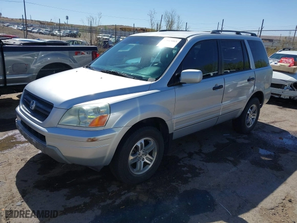 2004 Honda Pilot EX with VIN 2HKYF18674H581196, listed as a IAAI auction lot 42043003 with 220,102 mi miles. Bid and sale history available at carsss.com. Image 2.