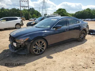 2016 Mazda 6 i Grand Touring с VIN JM1GJ1W55G1461719, выставлен на аукционе Copart как лот 58054385 с пробегом 102 641 миль миль и Списание • Salvage title. История ставок и продаж доступна на DreamBid. Изображение 1.