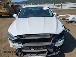 2019 Ford Fusion SEL with VIN 3FA6P0CD8KR117614, listed as a IAAI auction lot 42105025 with 135,801 mi miles and . Bid and sale history available at DreamBid. Image 13.