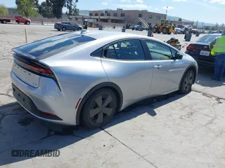 2024 Toyota Prius LE with VIN JTDACAAU3R3024761, listed as a IAAI auction lot 41992059 with 14,119 mi miles and . Bid and sale history available at DreamBid. Image 4.