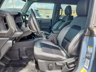 2024 Ford Bronco Big Bend with VIN 1FMDE7BH7RLA03788, listed as a Copart auction lot 65085065 with 10,597 mi miles and Salvage title. Bid and sale history available at DreamBid. Image 7.