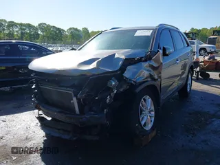 2014 Kia Sorento LX with VIN 5XYKTCA63EG506217, listed as a IAAI auction lot 42050413 with 126,806 mi miles and . Bid and sale history available at carsss.com. Image 17.