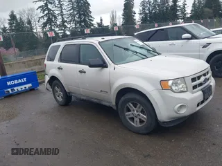 2009 Ford Escape Hybrid z VIN 1FMCU59309KA91876, wystawiony jako IAAI lot #41861855 z przebiegiem 163 260 mil mil oraz . Historia ofert i sprzedaży dostępna na DreamBid. Obrazek 1.