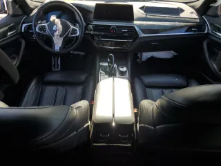 2023 BMW 5 Series M550i xDrive с VIN WBA13BK04PCM97306, выставлен на аукционе Copart как лот 76813754 с пробегом 19 259 миль миль и Списание • Salvage title. История ставок и продаж доступна на DreamBid. Изображение 8.
