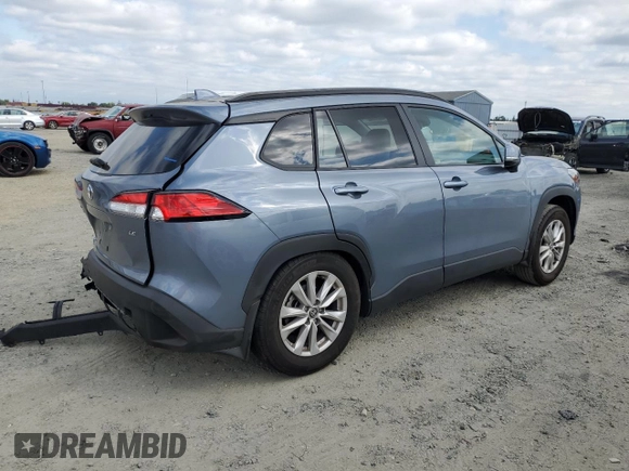 2023 Toyota Corolla Cross LE z VIN 7MUBAAAG6PV039602, wystawiony jako Copart lot #53419475 z przebiegiem 34 033 mil mil oraz Szkoda całkowita • Salvage title. Historia ofert i sprzedaży dostępna na DreamBid. Obrazek 3.