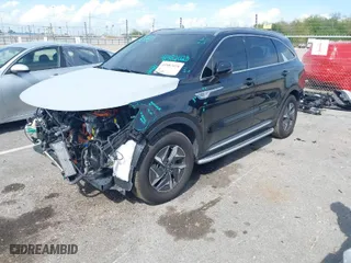 2021 Kia Sorento Hybrid S with VIN KNDRG4LG3M5038379, listed as a IAAI auction lot 41882028 with 50,836 mi miles. Bid and sale history available at carsss.com. Image 2.