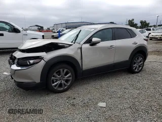 2023 Mazda CX-30 S Preferred z VIN 3MVDMBCM1PM562348, wystawiony jako Copart lot #59383805 z przebiegiem 11 858 mil mil oraz Szkoda całkowita • Salvage title. Historia ofert i sprzedaży dostępna na DreamBid. Obrazek 1.