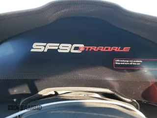 2022 Ferrari SF90 z VIN ZFF95NLA6N0276511, wystawiony jako Copart lot #45742815 z przebiegiem Nie podano mil oraz Szkody całkowita. Historia ofert i sprzedaży dostępna na DreamBid. Obrazek 9.