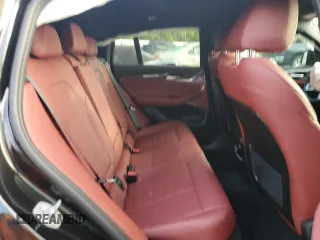 2024 BMW X4 M40i z VIN 5UX43DT00R9V20010, wystawiony jako Copart lot #51654125 z przebiegiem Nie podano mil oraz Nie do naprawy • Non repairable. Historia ofert i sprzedaży dostępna na DreamBid. Obrazek 10.