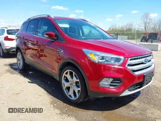 2017 Ford Escape Titanium with VIN 1FMCU9J96HUA68094, listed as a IAAI auction lot 42043893 with 85,893 mi miles. Bid and sale history available at carsss.com. Image 1.
