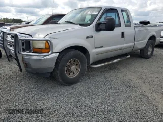 2001 Ford Super Duty F-250 XL with VIN 1FTNX20F61EB23095, listed as a Copart auction lot 74060304 with 458,656 mi miles and Salvage Title. Bid and sale history available at carsss.com. Image 1.