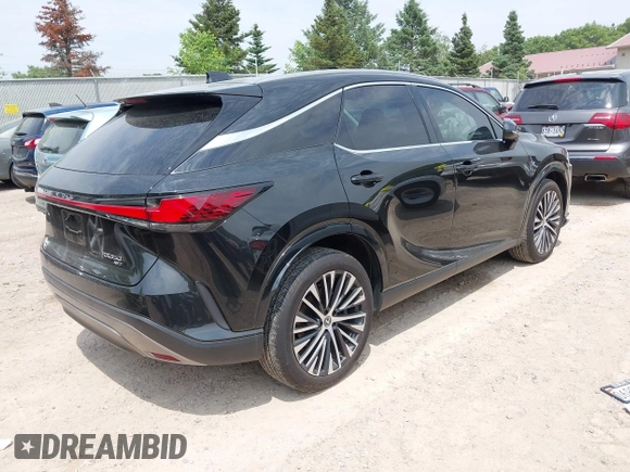 2023 Lexus RX 350 with VIN 2T2BAMCA6PC021707, listed as a IAAI auction lot 42487717 with 30,008 mi miles and . Bid and sale history available at DreamBid. Image 4.