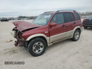 2002 Suzuki Grand Vitara z VIN JS3TE62V124152120, wystawiony jako Copart lot #46347055 z przebiegiem 197 558 mil mil oraz Szkoda całkowita • Salvage title. Historia ofert i sprzedaży dostępna na DreamBid. Obrazek 1.