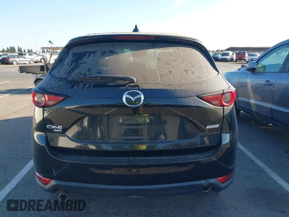 2018 Mazda CX-5 Grand Touring with VIN JM3KFBDM1J0345014, listed as a IAAI auction lot 42703926 with 151,453 mi miles and . Bid and sale history available at DreamBid. Image 16.