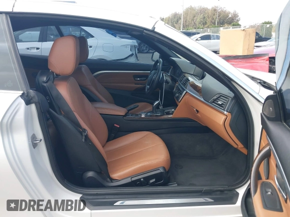 2015 BMW 4 Series 428i z VIN WBA3V7C56F5A24605, wystawiony jako IAAI lot #42506958 z przebiegiem 126 698 mil mil oraz . Historia ofert i sprzedaży dostępna na DreamBid. Obrazek 5.
