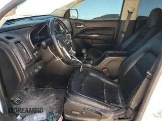2017 GMC Canyon 4WD SLT with VIN 1GTP6DE18H1301885, listed as a Copart auction lot 77217864 with 119,413 mi miles and Salvage Title. Bid and sale history available at carsss.com. Image 7.