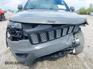 2021 Jeep Grand Cherokee Laredo E with VIN 1C4RJFAG4MC700384, listed as a IAAI auction lot 42192672 with 54,525 mi miles and . Bid and sale history available at DreamBid. Image 18.